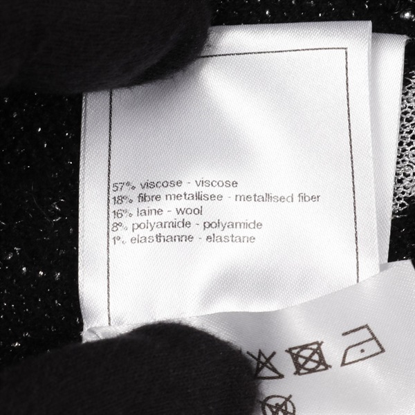 シャネル❤総ロゴ キャミソール カメリア付き❤未使用品 シャネル(CHANEL)シャネル カメリア ココマーク ニット 衣料品