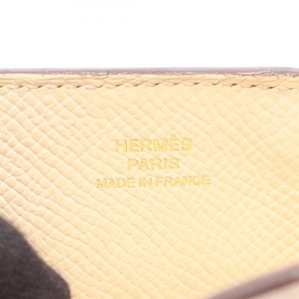 エルメス HERMES ウェイ フォンケース ナタ ルージュセリエ ジョーヌナプル 携帯・スマホアクセサリー アクセサリー ヴォーエプソン ヴォーエプソン U刻印（2022年製造） レディース アイボリー系 / イエロー系 / ブラウン系 【中古】 エルメス(HERMES)エルメス ウェイ フォンケース ナタ ルージュセリエ